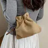 Bolso tipo cubo de alta gama, lujo ligero, vintage para mujer, nuevo modelo de otoño 2026, bolso de hombro de nicho para el día a día, bolso cruzado versátil