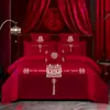 Juego de ropa de cama de lujo estilo chino, hecho de algodón 100% de fibra larga, un juego de cuatro piezas que incluye una sábana y una funda de edredón de algodón puro rojo, perfecto para la alcoba de una recién casada.