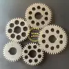 Piezas de Máquina de Tejer de Alta Velocidad Tipo 80.90 Caja de Lanzadera Portador de Lanzadera Máquina de Tejer de Cinta Peine de Trama Engranaje Regulador de Velocidad Engranaje de Doble Número