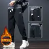 Calça de Moletom Masculina Outono e Inverno 2025 Nova Marca Tendência Cargo Jogger Calças Esportivas Casuais Harem Longas Pretas