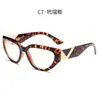 Estampado de leopardo nuevo marco grande lente transparente bloqueo de luz azul gafas de moda metal decorado para mujer personalidad europea americana bloqueo de color ojo de gato