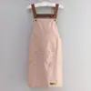 Delantales de comercio exterior personalizados, impermeables y a prueba de aceite, de color liso, para uso comercial, con impresión de logotipo para publicidad, regalos corporativos, disponibles para venta al por mayor