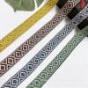 Fábrica en stock 2.5CM estilo nacional cinta de diamante jacquard por computadora cinta de poliéster bicolor de doble cara accesorios