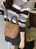 Bolso Cubo de Moda y Sencillo para Mujer, Nuevo Bolso de Mano y Bolso Cruzado con Patrón de Lichi Vintage 2026, Bolso de Commuter con Diseño de Nicho