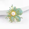2025 Nuevo Broche de Orquídea de Zirconia Azul Degradado de Gama Alta para Mujer Cobre Chapado en Oro Pin Versátil Portador Vacío de Corsage de Perla