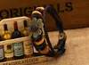 Pulseira de Couro Trançado Artesanal Estilo Retrô Simples e Artística com Design Criativo de Flor de Liga Metálica, um Acessório Popular Transfronteiriço