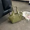 Bolsas de mano pequeñas de alta gama transfronterizas para mujer, nuevos bolsos de nicho populares 2026, bolsos versátiles de hombro y cruzados, bolsos tipo cubo