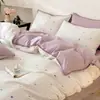 Nuevo modelo primavera y verano todo algodón estampado gofrado simple juego de casa de cuatro piezas dormitorio de estudiante tipo todo estación juego de tres piezas A 4