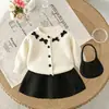 Conjunto de Suéter para Niña 2026 Nuevo Estilo Lazo Bloques de Color Cardigan Tejido Superior Conjunto de Suéter de Tres Piezas Primavera y Otoño