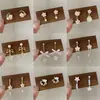 Pendientes Serie Flor de Cerezo Rosa para Mujer, Agujas de Plata, Elásticos, Dulces, Florales, de Nicho, de Gama Alta, Versátiles