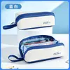 Estilo minimalista nueva bolsa de lápices impermeable y resistente a las manchas, bolsa de papelería de almacenamiento multicapa, gran capacidad, disponible en varios colores, bolsa de papelería escolar