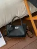 Exquisita y Compacta Bolsa Cesta de Verduras para Mujer 2026 Primavera Nueva Bolso de Hombro Cruzado de Cuero Suave Bolso de Mano para Viajes Diarios Bolso Cubo