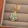 Pendientes de cobre chapado en oro real color aceite gota ojo de diablo hoja estilo Ins europeo y americano para mujer personalidad temperamento pendientes al por mayor