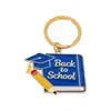 Llaveros personalizados más vendidos transfronterizos, dijes para mochilas, colgantes de aleación para la temporada de graduación, accesorios con temática de campus para las mochilas de los estudiantes