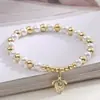 Pulseira de Pérolas Estilo Praia Ins Transfronteiriça Aogu para Mulheres Simples Acessível Luxo Versátil Pulseira com Pingente de Tartaruga Coqueiro