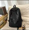 Mochila nueva brillante, mochila estudiantil transfronteriza de moda, mochila casual de viaje para la universidad, color sólido, gran capacidad, bolsa para computadora