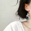 Aretes de Estilo Exótico de Venta Caliente Retro Literario Clásico Dignificado Ganchos para la Oreja Versátil Hueco Moda Borla Colgantes