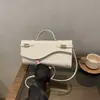2026 Verano Nuevo de Moda Elegante de Alto Valor Simple Casual con Estilo Versátil Bolso Cuadrado Pequeño de Hombro Cruzado de Mano