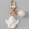 Chaveiro Pingente Ins Tendência Anjo de Asas Brancas Bola Colorida de Gelatina Acessório Personalizado para Bolsa e Capa de Fone de Ouvido