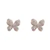 Pendientes Pequeños de Tachuela Mariposa de Circonita Japoneses Coreanos Exquisitos de Moda Dulces Versátiles Temperamento Lujo Ligero Sensación de Gama Alta Pendientes Súper Brillantes Venta al por Mayor