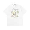 Camiseta de Manga Curta para Casal Amiri Pomba da Paz Tinta Flow Grafite Lettering 230g Série Coleção Estampa Clássica do Logo