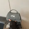 Bolso de hombro casual francés de moda, bolso de verano nuevo, bolso baguette texturizado de nicho, bolso de axila vintage con un toque de alta gama
