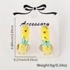 Aretes de anillo de flor gota de aceite mariposa con baño de oro de 18k diseño de nicho aretes transfronterizos europeos y americanos para mujer al por mayor