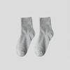 Calcetines de comercio exterior para hombre, calcetines hasta la pantorrilla, calcetines deportivos blancos y negros, medias de color liso, calcetines Zhuji para pareja, calcetines de mujer