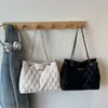 Otoño 2025 Nueva Tendencia de Moda Bolso Tote Simple de Color Sólido Bolso de Hombro Cruzado Bordado Acolchado Texturizado para Viajes