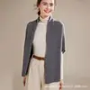 Nuevo modelo otoño temprano 2026 capa sin mangas color liso simple 100% cachemira chal de punto casual holgado para mujer