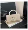 Bolsa Transversal Versátil Nova Tendência 2025 para Mulheres, Design de Nicho, Quadrada Pequena Texturizada Retro Casual da Moda para Ombro