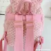 Mochila pequeña de felpa con orejas de conejo para mujer 2026 Nuevo estilo Mochila mini para niños Bolsa linda de corazón femenino