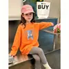 Camiseta de manga larga de algodón puro para niñas, nuevo estilo primavera y otoño, top casual holgado para niños mayores, elegante camiseta básica de cuello redondo para niñas