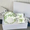 Suministro Directo Transfronterizo D Moda Juego de Tazas de Café de Porcelana Hueso Estilo Europeo Juego de Té de la Tarde Lirio del Valle Café 2 Tazas 2 Platos Caja de Regalo