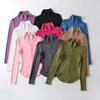 Otoño estilo europeo y americano sin forro polar Cintura de hormiga solapa top chica hot ajustado elástico cremallera manga corta larga camiseta mujer