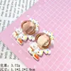 Cachorros de dibujos animados tela tela resina accesorios pegamento de crema horquilla DIY cuerda hebilla de zapato colgante decoración de taza material lote