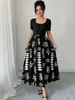 Vestido de Verano 2026 Nuevo Estilo Europeo y Americano con Estampado y Patchwork, Corte A para Mujer, Elegante y Adelgazante, Vestido Largo, Artículo Popular Transfronterizo