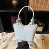 Moda de Nicho Bolsa de Balde Simples para Mão Bolsa Transversal para Mulheres 2026 Primavera Novo Estilo Bolsa de Ombro Casual para o Dia a Dia