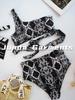 Traje de baño europeo y americano transfronterizo para mujer 2023, dos piezas, traje de baño negro y blanco con amarre, bikini para mujer, alta elasticidad y durabilidad, moda europea y americana