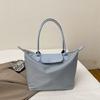 Bolsa de ombro casual de grande capacidade para todos os tipos de macarrão macio, popular deste ano, para mulheres, bolsa de viagem de nicho, bolsa de axila