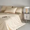 Conjunto de quatro peças de algodão de fibra longa de Xinjiang com 120 fios 100% algodão puro capa de edredom lençol de cama capa de colchão de alta qualidade têxtil para casa Nantong