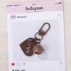 Chaveiro de miçangas de quebra-cabeça com tag de coração colorida e sino, chaveiro de decoração de bolsa DIY feito à mão, doce e simples