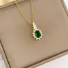 Collar de Moda Estilo Coreano con Colgante Ovalado de Diamante y Cristal Verde Cruzado Amazon Acero Inoxidable Zirconia Collar de Girasol
