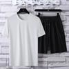 Traje deportivo al aire libre de seda helada, suelto, transpirable, de manga corta, camiseta de verano de secado rápido, pantalones cortos deportivos para correr para hombres y mujeres.