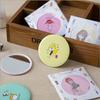 Espejo pequeño coreano con dibujos animados, mini espejo de maquillaje portátil, pequeño espejo redondo, mini espejo de hojalata.