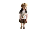 Camisetas para niños y niñas ropa de verano 2026 nuevo moderno genial moda estampado de grafiti popular manga corta pantalones cortos conjunto de dos piezas