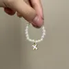Mini Labubu Cuarta Generación Caja Sorpresa Ropa de Muñeca Collar Colgante Labubu 26 Letras Collar de Perlas Accesorios de Joyería