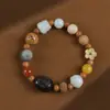 Semilla de Bodhi Seis Tonos Cinco Ojos Guofeng Cadena Portátil Guofeng Giro a Mano Orbe de Tesoros Múltiples 18 Zis DIY Tesoro Moda Marea Nacional