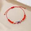 Pulsera tejida de mariposa al por mayor transfronterizo, pulsera de cuentas para parejas y amigos, pulsera de cordón de cera ajustable con mariposa de aleación