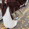 Bolso de bolos de mano con sensación retro francesa de alta gama para mujer, nueva moda casual otoño e invierno 2024, bolso bandolera diagonal